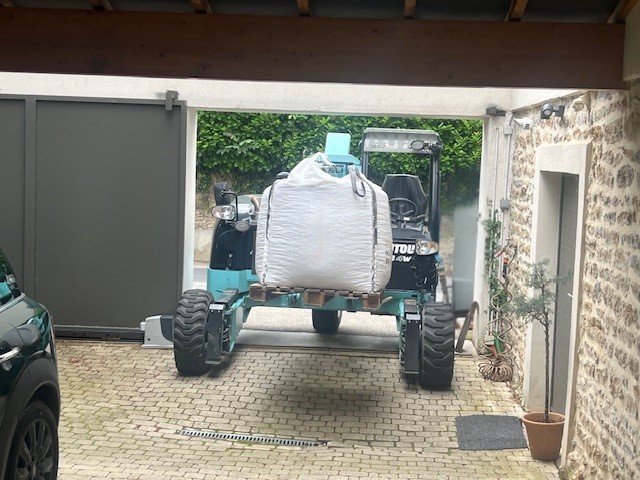 Cargomatic livraison directe domicile big bag en passant sous la porte de garage