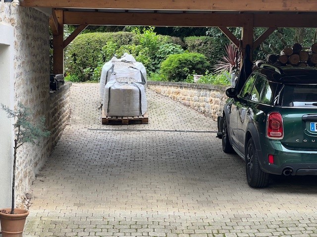 Cargomatic livraison directe domicile big bag en passant sous la porte de garage